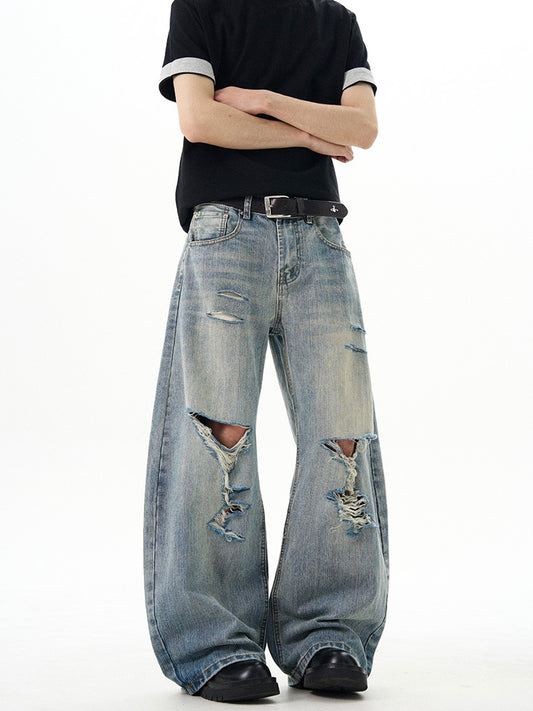 ウォッシュ ブルーダメージ バギージーンズ