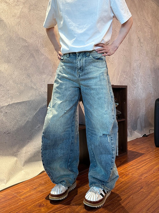 スクラッチド ウォッシュ バギージーンズ