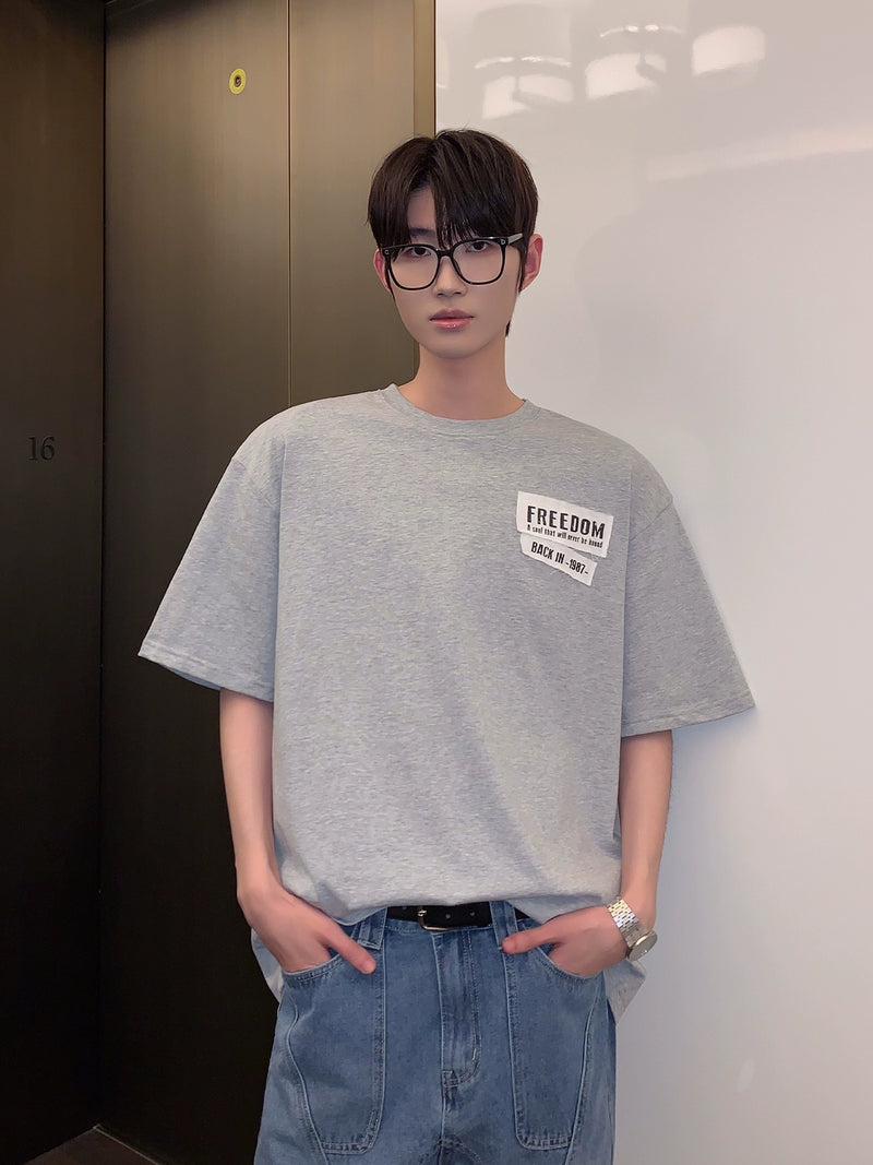バックプリント オールドパッチレターTシャツ